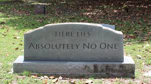 tombstone with inscription: "Here Lies Absolutely No One"