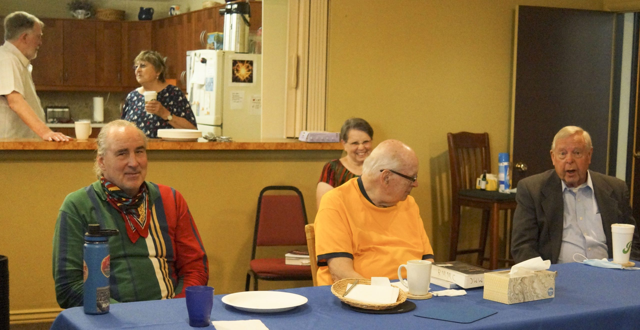 RMMC talk attendees (6 including Iron Eagle, Bob Bennett, Sr.; in kitchen Jim Godfrey and Maureen Ewell)